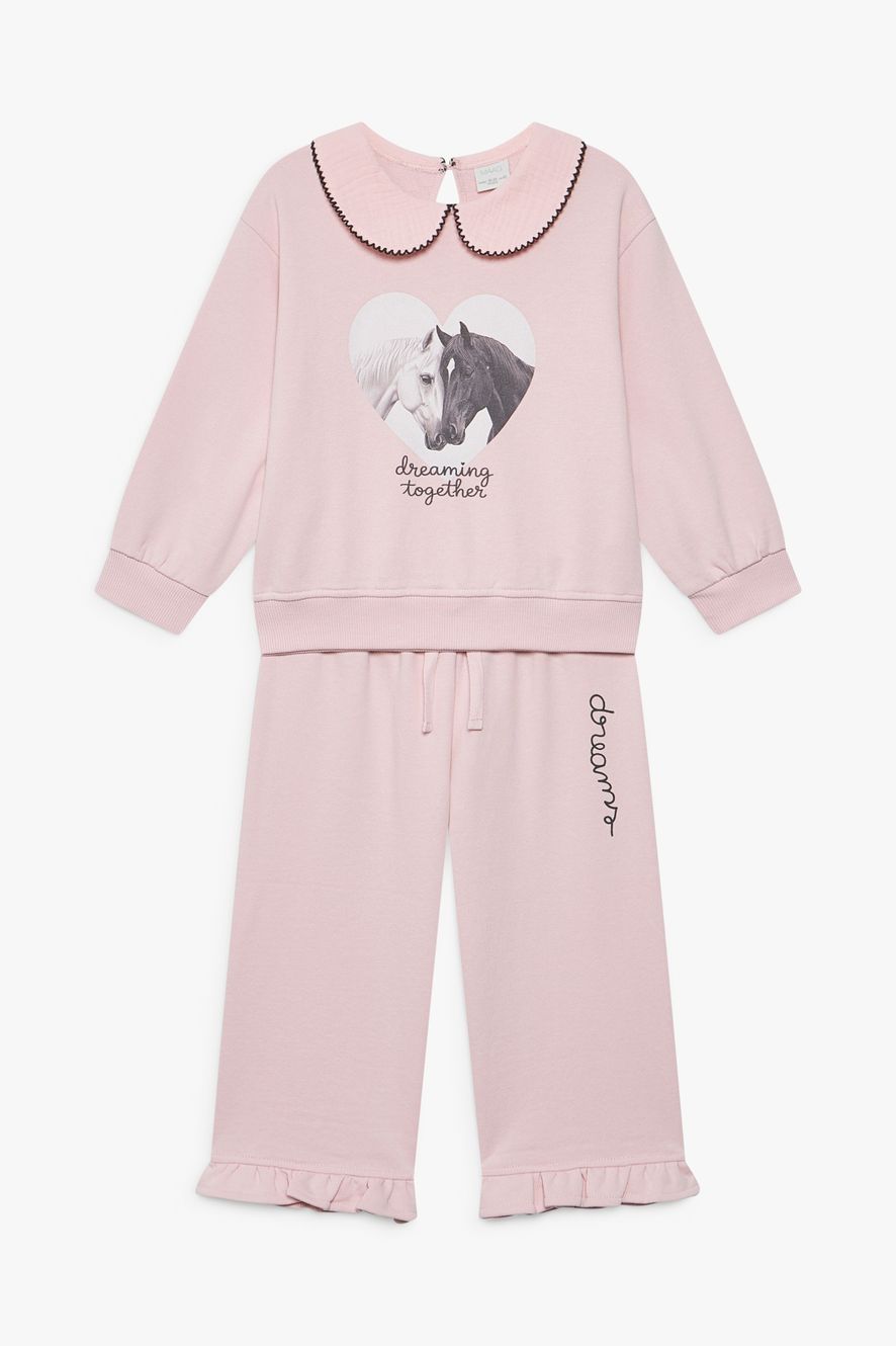 БРЮКИ ШИРОКОГО КРОЯ С РЮШАМИ